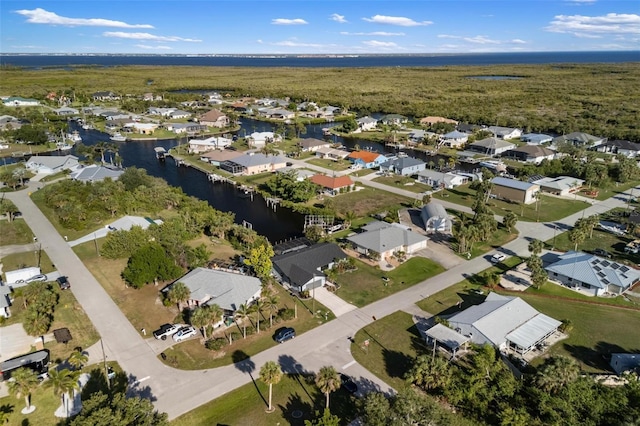 5140 Administration St, Port Charlotte, FL 33948 - aerial view of property and surrounding area featuring nearby suburban area and a large body of water