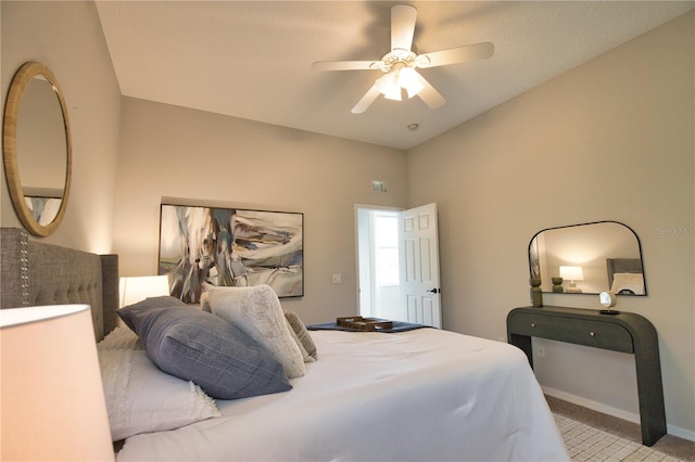 8209 Snowy Egret Pl, Bradenton, FL 34202 - bedroom with light colored carpet, a ceiling fan, baseboards, and lofted ceiling