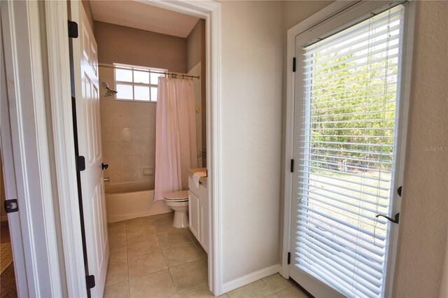 8209 Snowy Egret Pl, Bradenton, FL 34202 - full bath featuring tile patterned flooring, shower / bath combination with curtain, toilet, and vanity