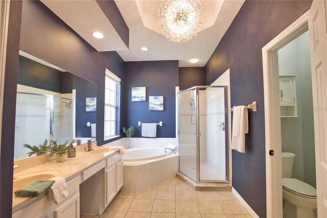 8209 Snowy Egret Pl, Bradenton, FL 34202 - bathroom with a bath, a stall shower, tile patterned flooring, toilet, and double vanity