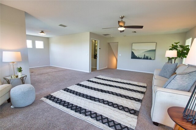 8209 Snowy Egret Pl, Bradenton, FL 34202 - carpeted living room featuring baseboards and ceiling fan