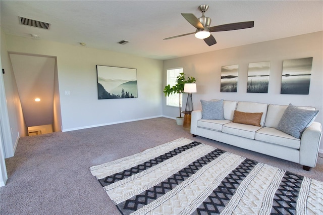 8209 Snowy Egret Pl, Bradenton, FL 34202 - carpeted living room with a ceiling fan and baseboards