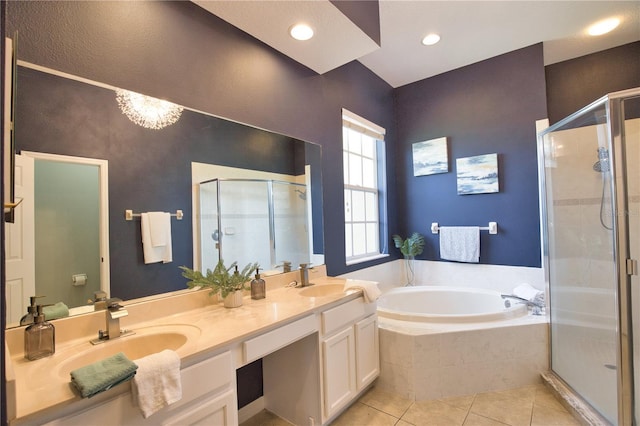 8209 Snowy Egret Pl, Bradenton, FL 34202 - full bathroom featuring a bath, a stall shower, tile patterned floors, double vanity, and recessed lighting
