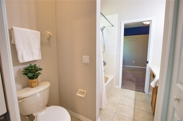 8209 Snowy Egret Pl, Bradenton, FL 34202 - bathroom featuring toilet, tile patterned flooring, shower / washtub combination, baseboards, and vanity