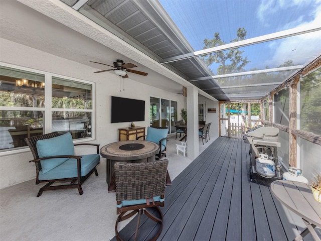460 Bard Rd, Venice, FL 34293 - deck with a fire pit, outdoor dining area, ceiling fan, and a grill