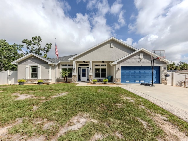 460 Bard Rd, Venice, FL 34293 - view of front facade with stone siding, stucco siding, and a garage