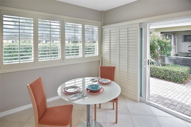 1104 Auburn Cove Cir, Venice, FL 34292 - dining room with baseboards and light tile patterned floors