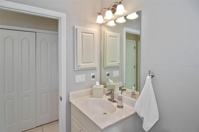 1104 Auburn Cove Cir, Venice, FL 34292 - bathroom featuring a closet, vanity, a chandelier, and tile patterned flooring