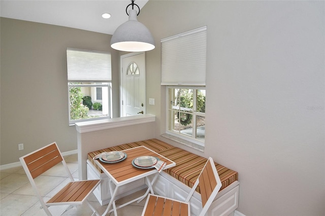 1104 Auburn Cove Cir, Venice, FL 34292 - dining area with baseboards, tile patterned floors, and breakfast area