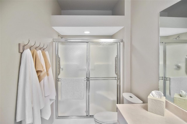 1104 Auburn Cove Cir, Venice, FL 34292 - bathroom featuring vanity, a stall shower, and toilet