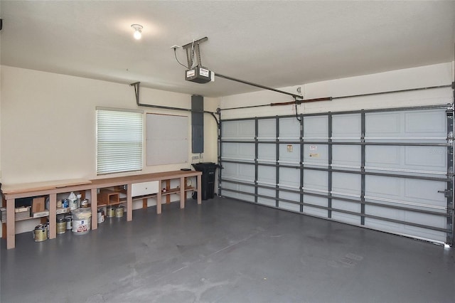 1104 Auburn Cove Cir, Venice, FL 34292 - garage featuring a garage door opener