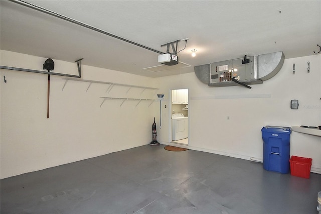 1104 Auburn Cove Cir, Venice, FL 34292 - garage featuring a garage door opener and washer and dryer