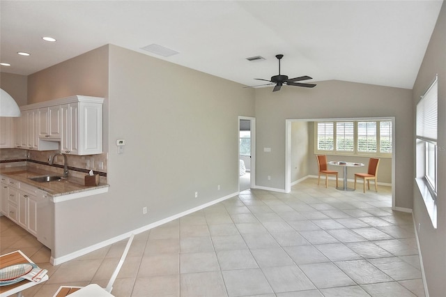 1104 Auburn Cove Cir, Venice, FL 34292 - living room featuring a ceiling fan, vaulted ceiling, light tile patterned flooring, recessed lighting, and baseboards