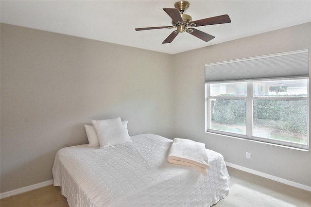 1104 Auburn Cove Cir, Venice, FL 34292 - bedroom with baseboards, light colored carpet, and ceiling fan