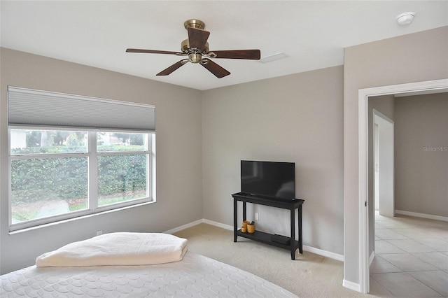 1104 Auburn Cove Cir, Venice, FL 34292 - bedroom featuring baseboards, a ceiling fan, and light colored carpet