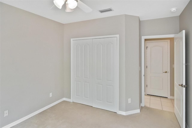 1104 Auburn Cove Cir, Venice, FL 34292 - unfurnished bedroom with light colored carpet, a closet, and baseboards