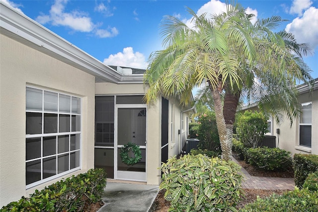 1104 Auburn Cove Cir, Venice, FL 34292 - property entrance featuring stucco siding