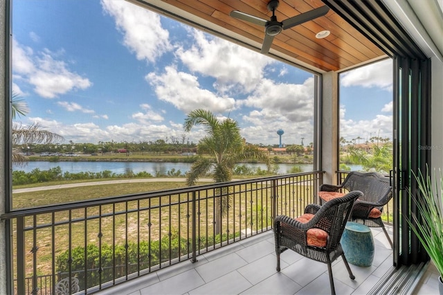 209 E Venice Ave, Venice, FL 34285 - balcony featuring a water view and a ceiling fan