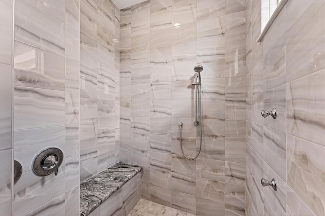 209 E Venice Ave, Venice, FL 34285 - bathroom featuring tiled shower