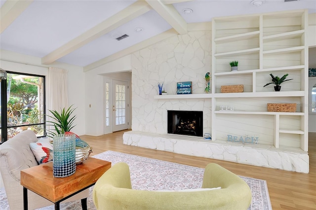 915 S Doral Ln, Venice, FL 34293 - living area with wood finished floors and a large fireplace