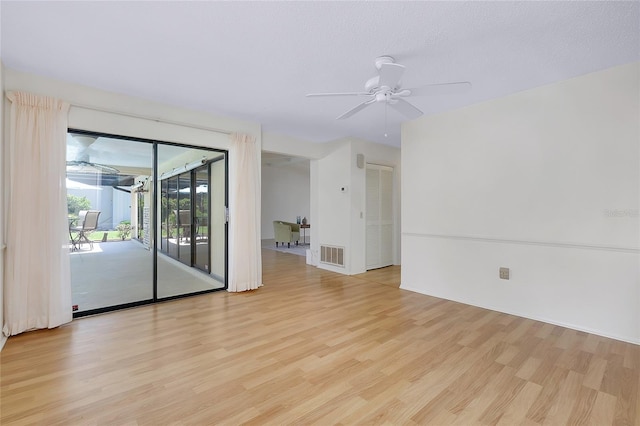 915 S Doral Ln, Venice, FL 34293 - unfurnished room featuring light wood-style floors and ceiling fan
