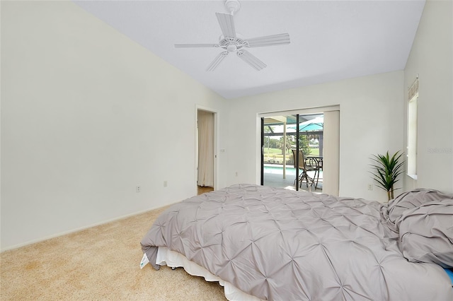 915 S Doral Ln, Venice, FL 34293 - bedroom with access to outside, carpet floors, ceiling fan, baseboards, and lofted ceiling