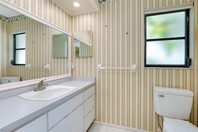 915 S Doral Ln, Venice, FL 34293 - bathroom featuring toilet, wallpapered walls, vanity, and tile patterned floors