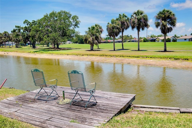 915 S Doral Ln, Venice, FL 34293 - dock area with a water view and a yard