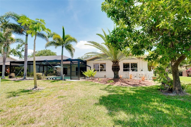 915 S Doral Ln, Venice, FL 34293 - rear view of property with glass enclosure, a yard, and an outdoor pool