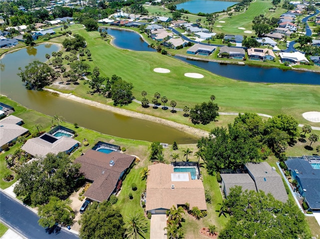 915 S Doral Ln, Venice, FL 34293 - aerial overview of property's location featuring nearby suburban area, a golf course, and a large body of water