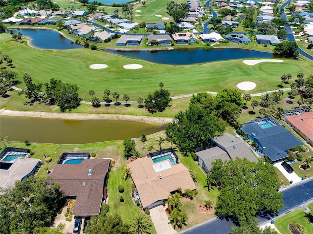 915 S Doral Ln, Venice, FL 34293 - aerial view of property and surrounding area with nearby suburban area, a golf course, and a nearby body of water