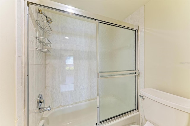 618 Bird Bay Dr S Unit 110, Venice, FL 34285 - bathroom featuring enclosed tub / shower combo and toilet