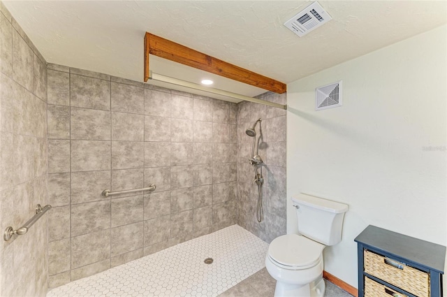 618 Bird Bay Dr S Unit 110, Venice, FL 34285 - bathroom with toilet and a tile shower
