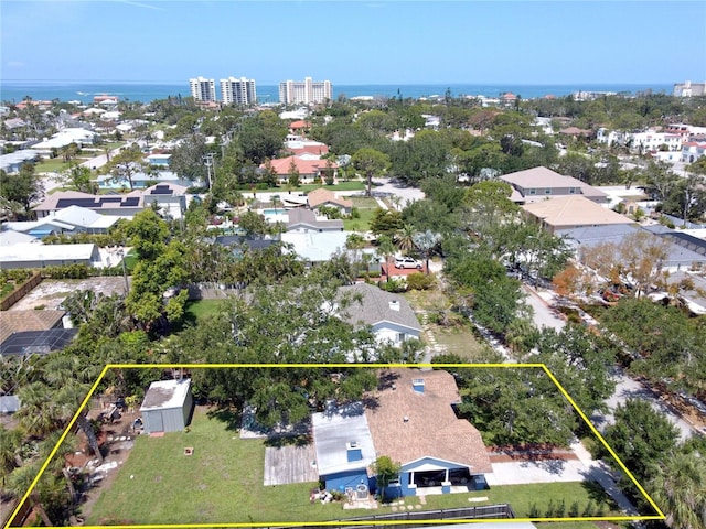 413 Valencia Rd, Venice, FL 34285 - aerial view of property and surrounding area with property parcel outlined and a large body of water