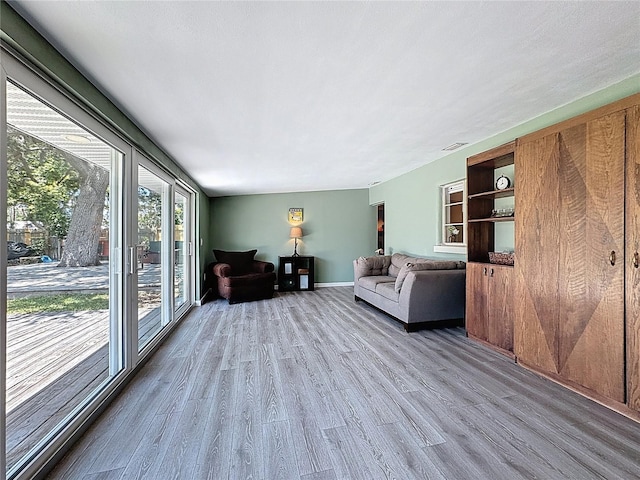 413 Valencia Rd, Venice, FL 34285 - living room featuring wood finished floors and baseboards