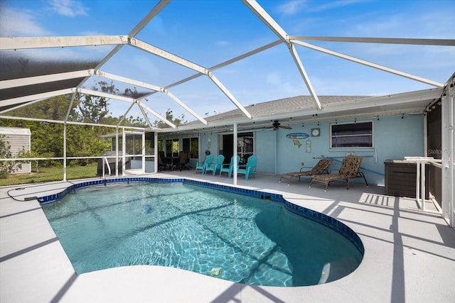 9277 Saint Catherine Ave, Englewood, FL 34224 - outdoor pool featuring a patio area, a ceiling fan, and glass enclosure