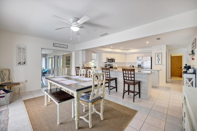 9277 Saint Catherine Ave, Englewood, FL 34224 - dining space featuring ceiling fan, light tile patterned floors, and recessed lighting