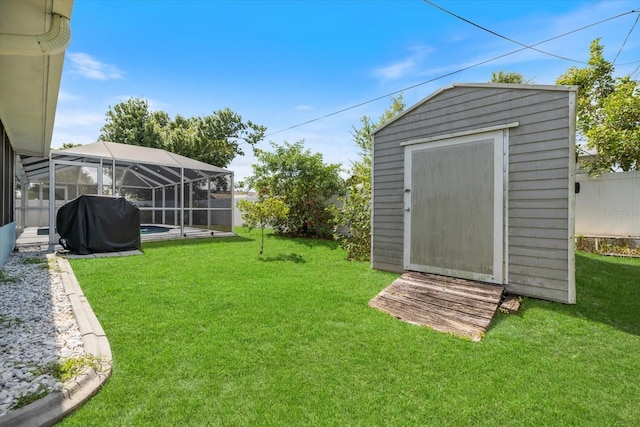 9277 Saint Catherine Ave, Englewood, FL 34224 - view of grassy yard featuring glass enclosure