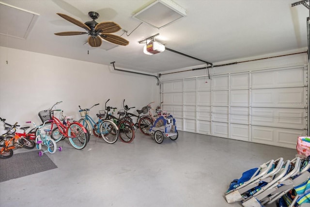 9277 Saint Catherine Ave, Englewood, FL 34224 - garage with a garage door opener and a ceiling fan