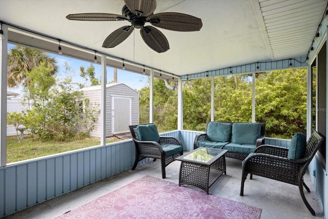 9277 Saint Catherine Ave, Englewood, FL 34224 - sunroom / solarium with an outdoor hangout area, plenty of natural light, and a ceiling fan