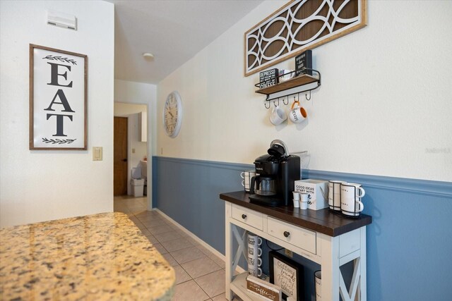 9277 Saint Catherine Ave, Englewood, FL 34224 - corridor featuring light tile patterned floors