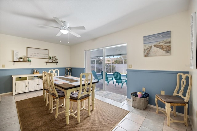 9277 Saint Catherine Ave, Englewood, FL 34224 - dining room with light tile patterned floors and ceiling fan