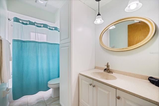 9277 Saint Catherine Ave, Englewood, FL 34224 - bathroom with vanity, toilet, and tile patterned flooring