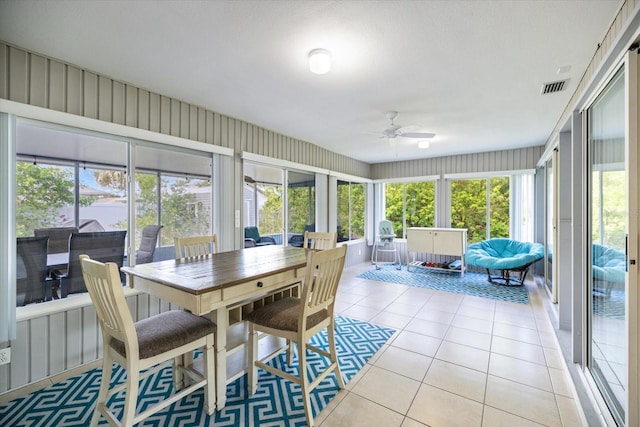9277 Saint Catherine Ave, Englewood, FL 34224 - sunroom featuring ceiling fan
