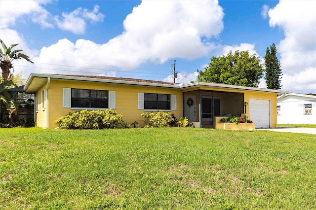 306 E Penn Rd, Lehigh Acres, FL 33936 - ranch-style house featuring a garage, driveway, and a front yard