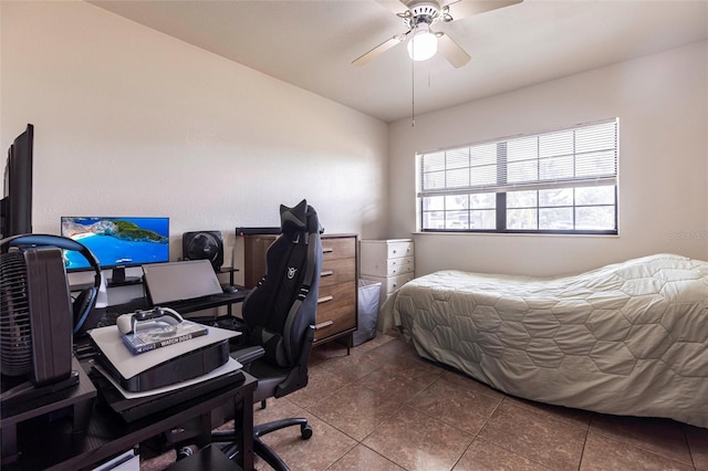 306 E Penn Rd, Lehigh Acres, FL 33936 - bedroom featuring tile patterned floors, a desk, and ceiling fan