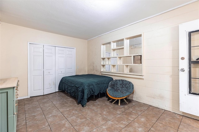 306 E Penn Rd, Lehigh Acres, FL 33936 - bedroom with a closet and light tile patterned floors