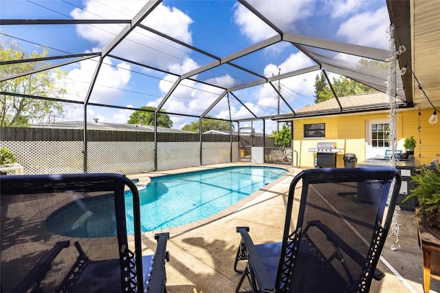 306 E Penn Rd, Lehigh Acres, FL 33936 - view of swimming pool featuring a patio area and glass enclosure