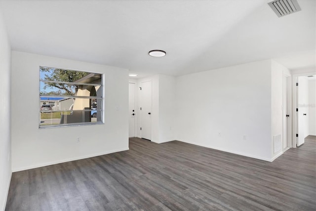 1032 Elaine St, Venice, FL 34285 - empty room with wood finished floors and baseboards