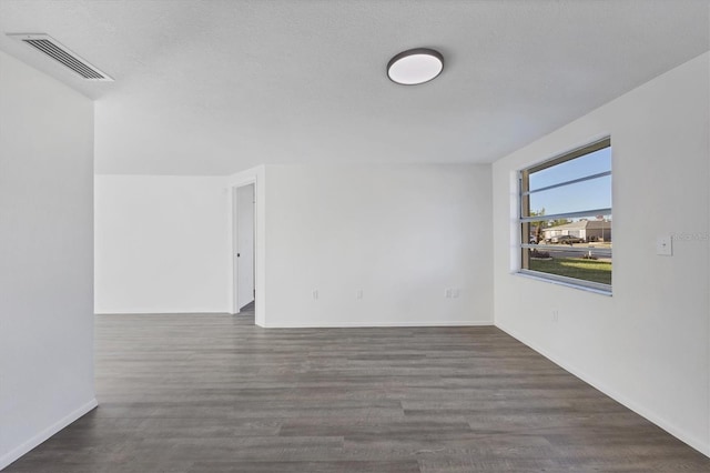 1032 Elaine St, Venice, FL 34285 - spare room with wood finished floors and baseboards